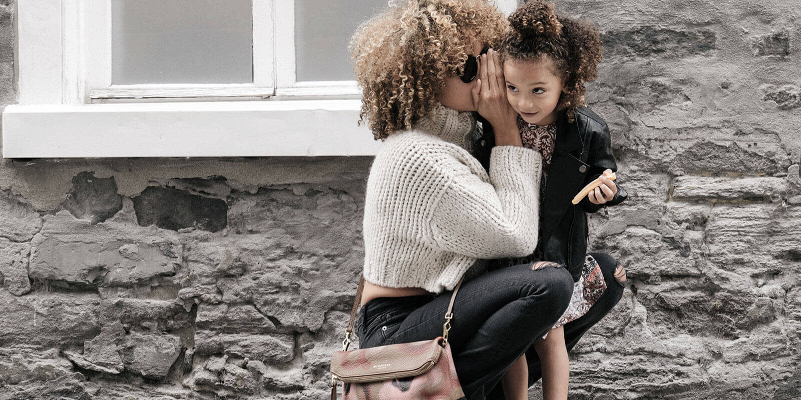 Whispering fashion secrets to daughter?